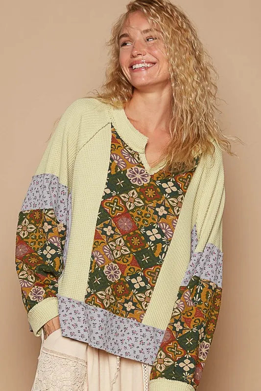 POL Exposed Seam Printed Notched Raglan Sleeve Knit Top - Brittney MADE