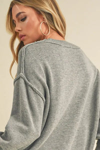 Aemi+Co Ribbed Hem Exposed Seam Round Neck Sweater - Brittney MADE