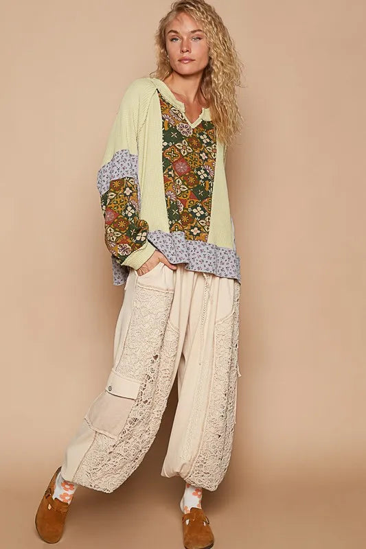 POL Exposed Seam Printed Notched Raglan Sleeve Knit Top - Brittney MADE