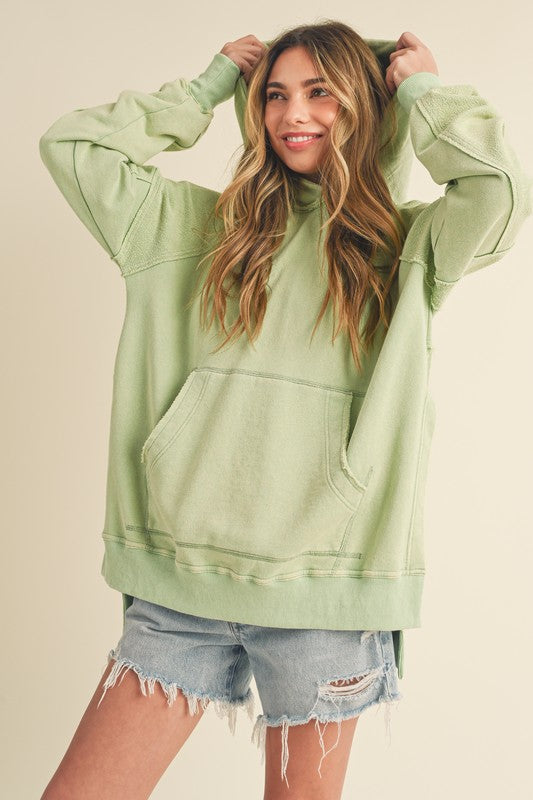Aemi + Co Exposed Seam Side Slit Hoodie with Kangaroo Pocket - Brittney MADE