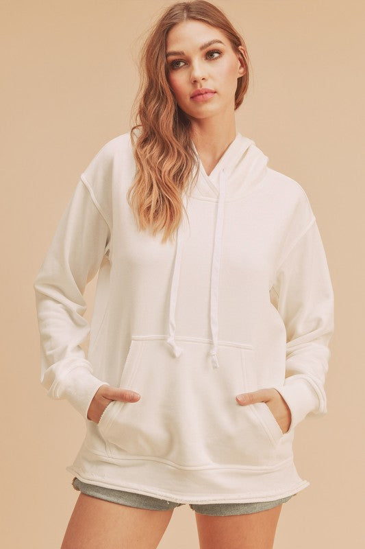 Aemi + Co Raw Hem Kangaroo Pocketed Drawstring Hoodie - Brittney MADE