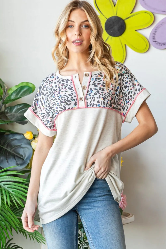 Heimish Full Size Exposed Seam Leopard Short Sleeve T-Shirt - Brittney MADE