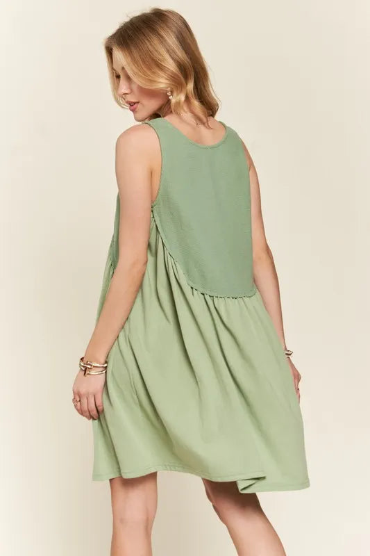ADORA Decorative Button Sleeveless Babydoll Dress - Brittney MADE