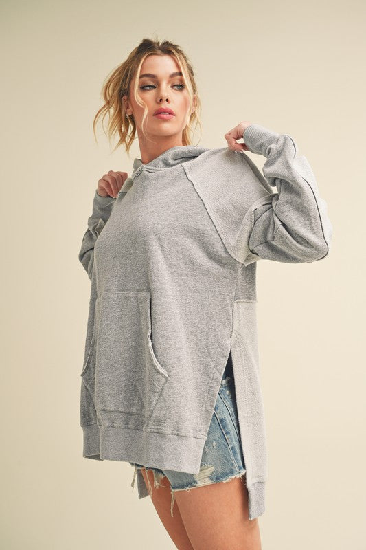 Aemi + Co Exposed Seam Side Slit Hoodie with Kangaroo Pocket - Brittney MADE