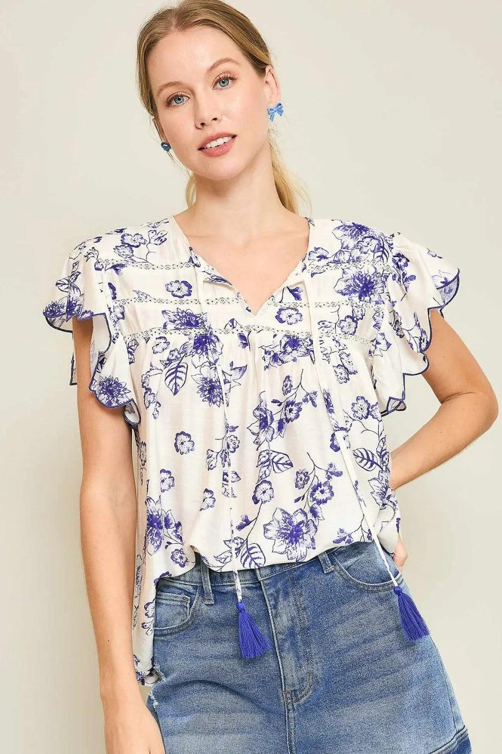 Umgee Full Size Floral Print Tassel Tie Neck Scalloped Sleeve Blouse Plus Size - Brittney MADE