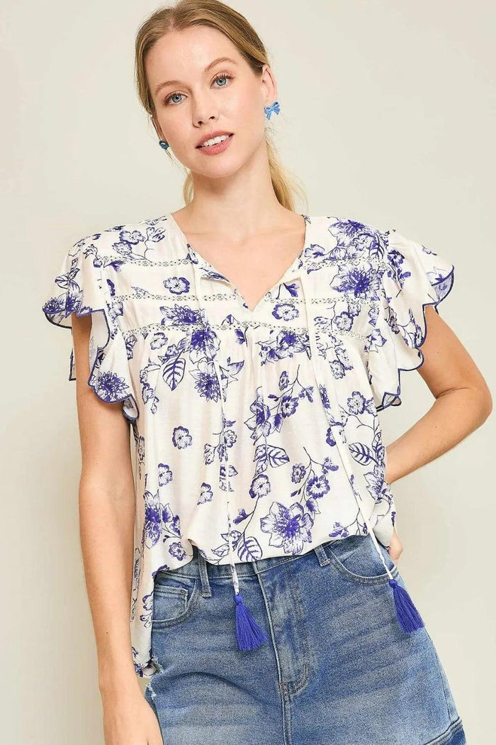 Umgee Full Size Floral Print Tassel Tie Neck Scalloped Sleeve Blouse Plus Size - Brittney MADE