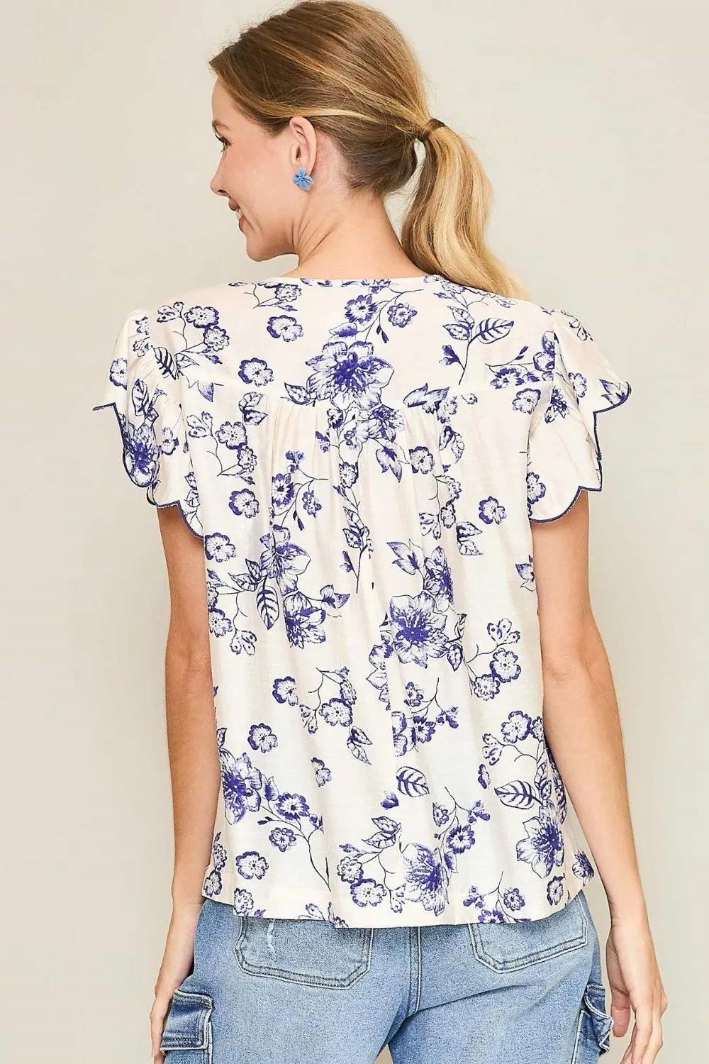 Umgee Full Size Floral Print Tassel Tie Neck Scalloped Sleeve Blouse Plus Size - Brittney MADE