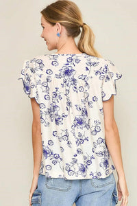 Umgee Full Size Floral Print Tassel Tie Neck Scalloped Sleeve Blouse Plus Size - Brittney MADE